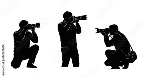 Three photographers in silhouette taking pictures with cameras
