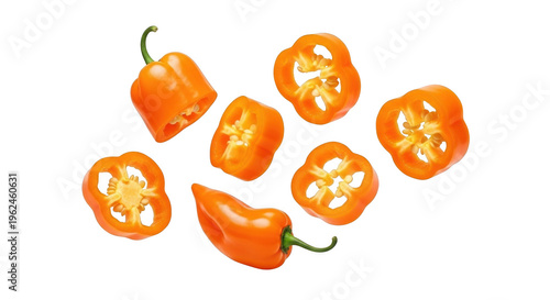 A vibrant arrangement of habanero peppers both whole and sliced showcasing their bright orange color on transparent background