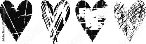 set of four black and white grunge hearts with distressed and scratched texture