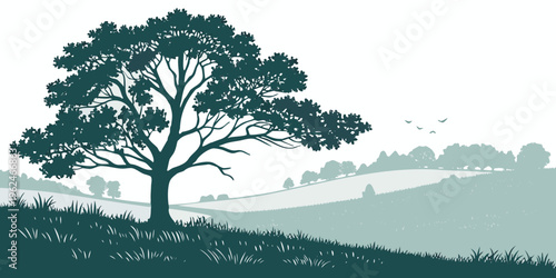 A majestic tree standing tall on a hillside overlooking a vast landscape