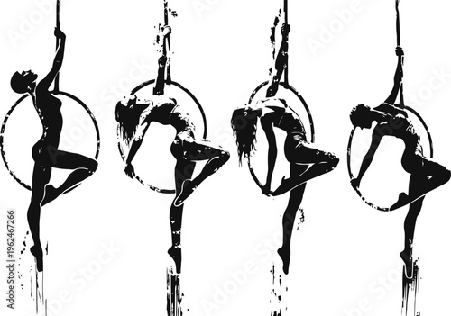 Silhouettes of aerial hoop performers demonstrating flexibility and strength in graceful poses