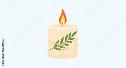 Peaceful beige candle with a bright orange flame decorated with a small green leaf branch tied with a thin string for home and spa atmospheres.