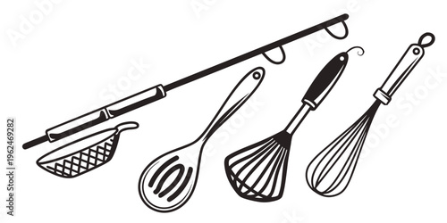 Assorted kitchen utensils including a skimmer, slotted spoon, and whisk