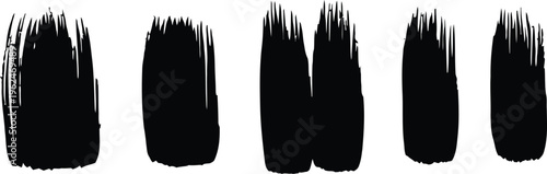 Four black brush strokes on a white background