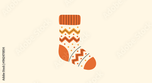 Single cozy winter sock with colorful zigzag patterns and orange heel and toe shown on a plain light background.