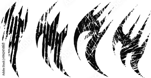 Set of four black claw marks with scratched and grunge textures isolated on white background