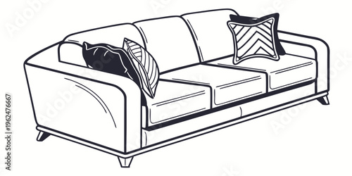 A cozy white sofa with black and white pillows in a modern living room setting