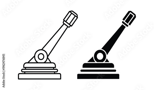 Silhouette of two identical desk lamp silhouettes in black and white