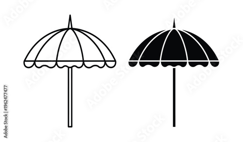 Silhouette of two beach umbrellas with different canopy colors
