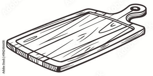 A wooden cutting board with a handle resting on a flat surface.