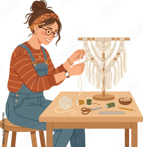 Artisan woman creates macrame wall hanging.