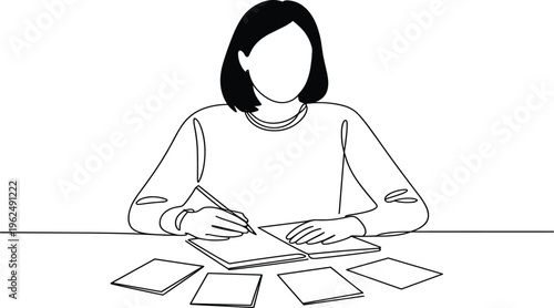 Woman in white shirt and black hair reading book at wooden desk indoors