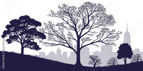 Silhouette of trees on a hill during sunset with a clear sky