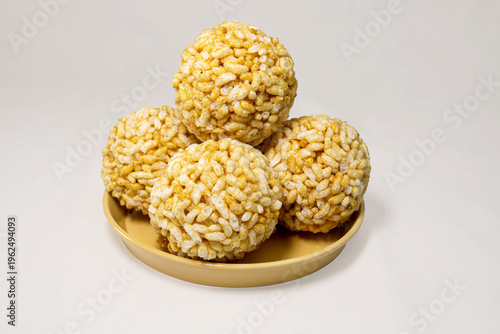 Sweet Puffed Rice balls for sell. Bengali Traditional Puffed Rice Balls is a sweet made using puffed rice mixed with jaggery, Murmura Laddoo, Churmura Laddoo or Pori Urundai.