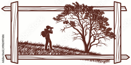 A person walking along a path surrounded by trees and a fence in a countryside setting