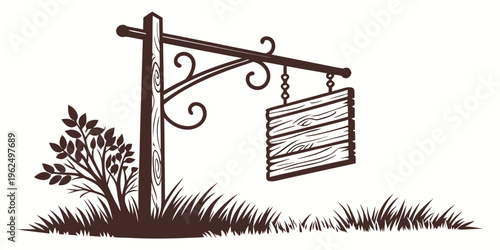 A vintage style signpost with a blank sign hanging from it in a grassy area.