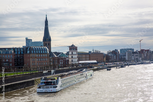 фотографія Dusseldorf - Germany, February 15, 2024, MS Oscar Wilde River Cruise Ship Passin