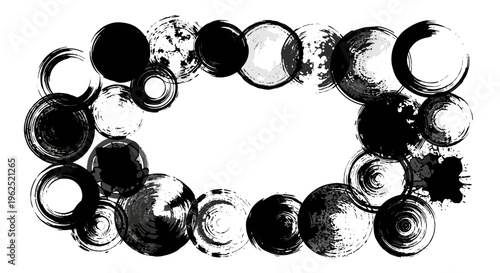 Abstract ink brush strokes forming an oval frame with textured circles and spots
