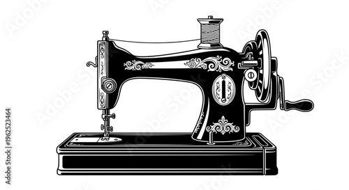 Vintage black sewing machine with floral patterns and spool