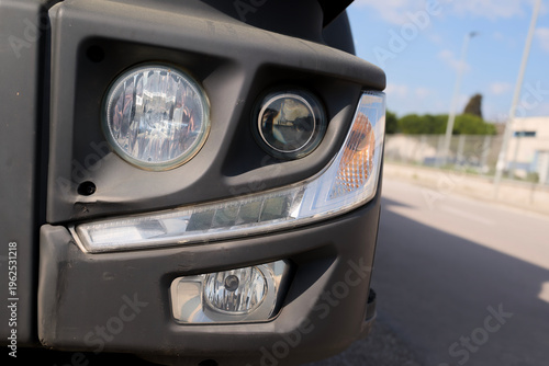 Obraz na plátne Modern semi-truck headlamp with fog light and led turn signal.