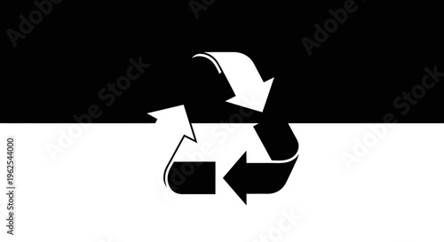 Recycling symbol on black and white background.