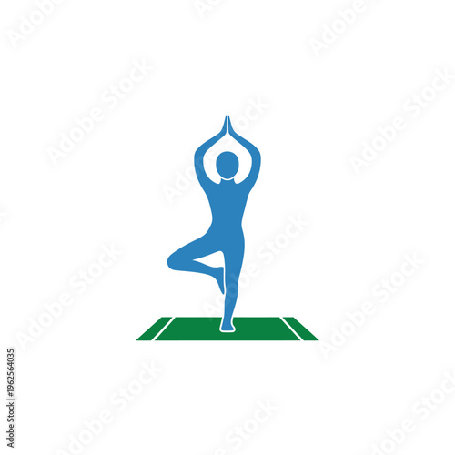 A person in a yoga pose on a green mat.