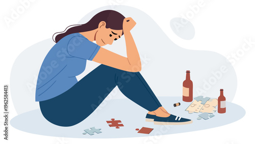 A sad woman sits on the floor surrounded by empty bottles and puzzle pieces