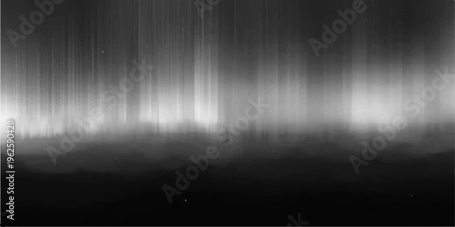 captivating aurora borealis paints the night sky with ethereal light, showcasing natural wonder in stark monochrome tones.