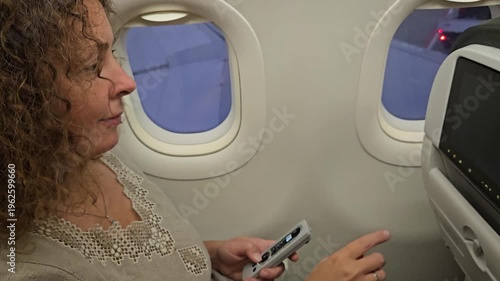 Large airport with a lot of vehicles and people. Scene is busy and bustling