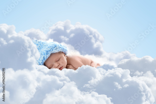 Cuadro en lienzo Adorable little baby sleeping among fluffy clouds