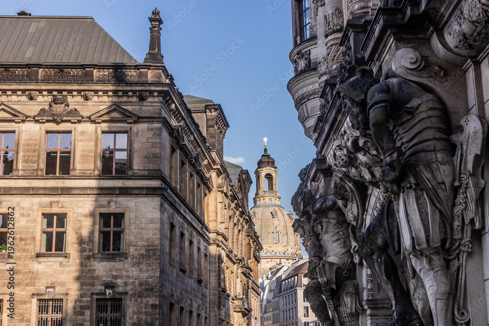 Obraz premium View of Frauenkirche church through Augustusstrasse street in Dresden, Germany