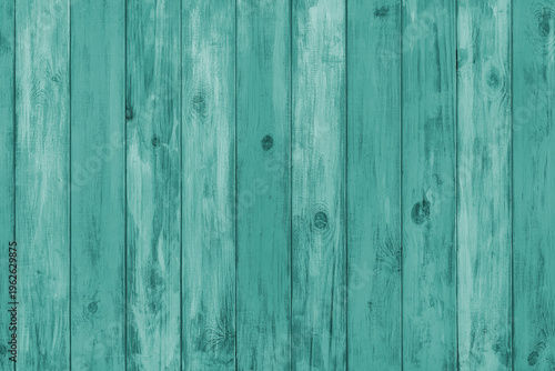 Turquoise colored painted wooden board with visible grain and vertical planks, wall wooden surface. Rustic wood texture background, design element, wallpaper, backdrop