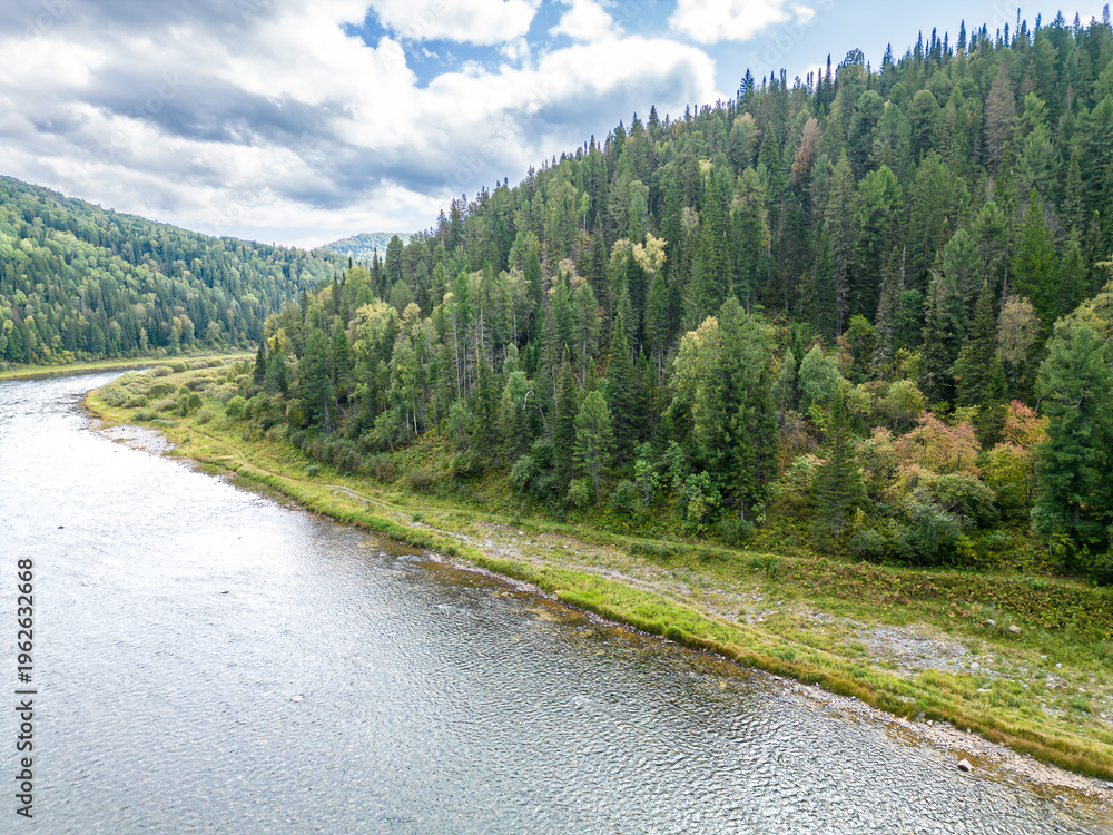 Fototapeta premium Beautiful Kiya River showing modern travel trends and digital experiences for tourists in Kemerovo region Siberian countryside