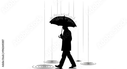 Silhouette of a person walking with an umbrella in the rain