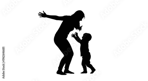 Silhouette of a woman and a child playing together happily