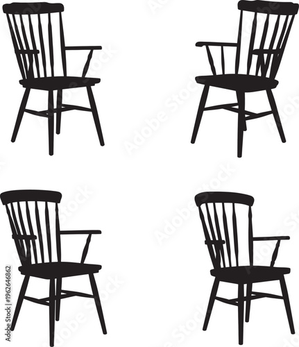 Four black wooden chairs with armrests arranged in two rows