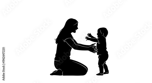 Mother helping little child to stand and walk alone slowly