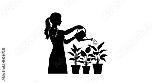 Woman watering plants with a watering can in her garden