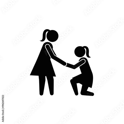 Two girls holding hands in solidarity.