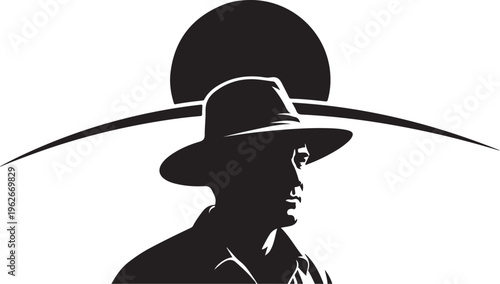 Silhouette of a man wearing a hat in profile view