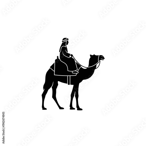 Silhouette of a person riding a camel, symbolizing desert travel and ancient transportation