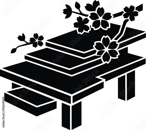 Traditional japanese tiered stand decorated with blooming cherry blossom branches and sakura flowers silhouette.