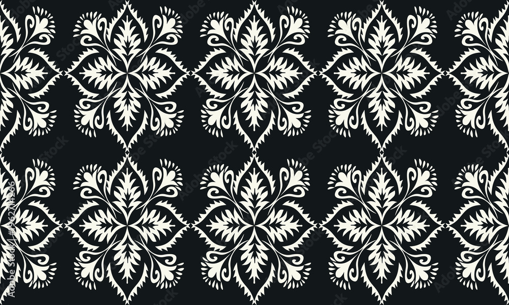 Fototapeta premium Classic black and white ornamental floral pattern with intricate symmetrical motifs. Elegant seamless repeating design, ideal for textile, fabric, and wallpaper.