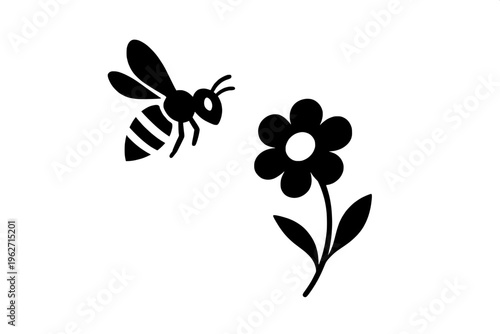 Honey bee flying near spring flower nature pollination silhouette