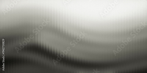 A grayscale abstract background with a wavy pattern and a gradient of light to dark tones
