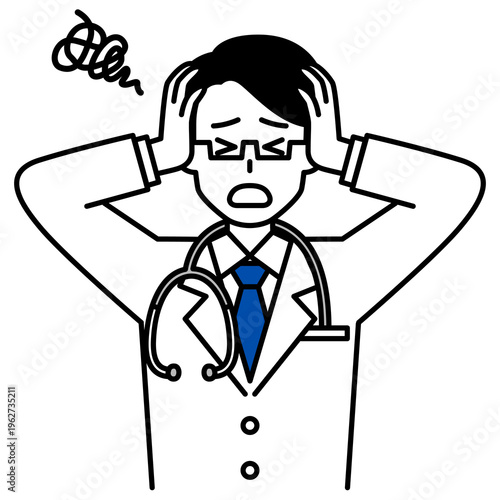 頭を抱えて悩む医師の男性