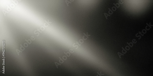 A dramatic abstract background with vibrant light rays shining through a dark space