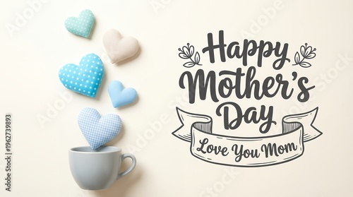 A collection of pastel colored stuffed hearts spills from a cup beside a Happy Mother's Day Love You Mom inscription mother day celebration greeting gift sentiment affection