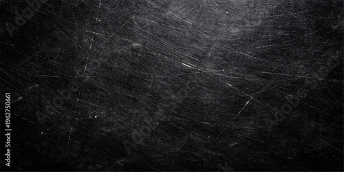 Dark grunge black and white paper texture with an old vintage gray concrete wall pattern on a rough blank backdrop surface for a dirty dark blackboard design