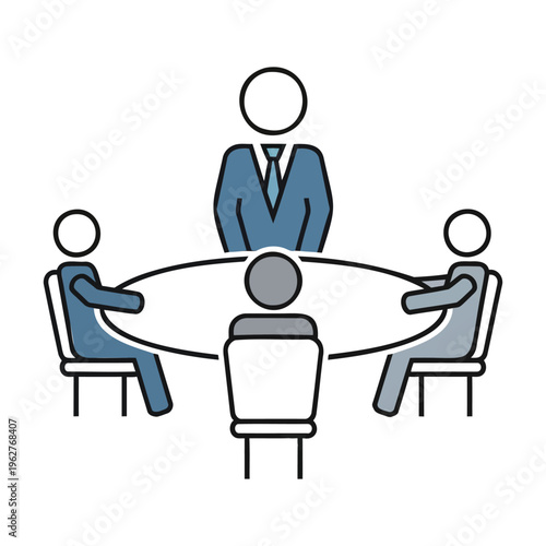 four people sitting around a table in a meeting